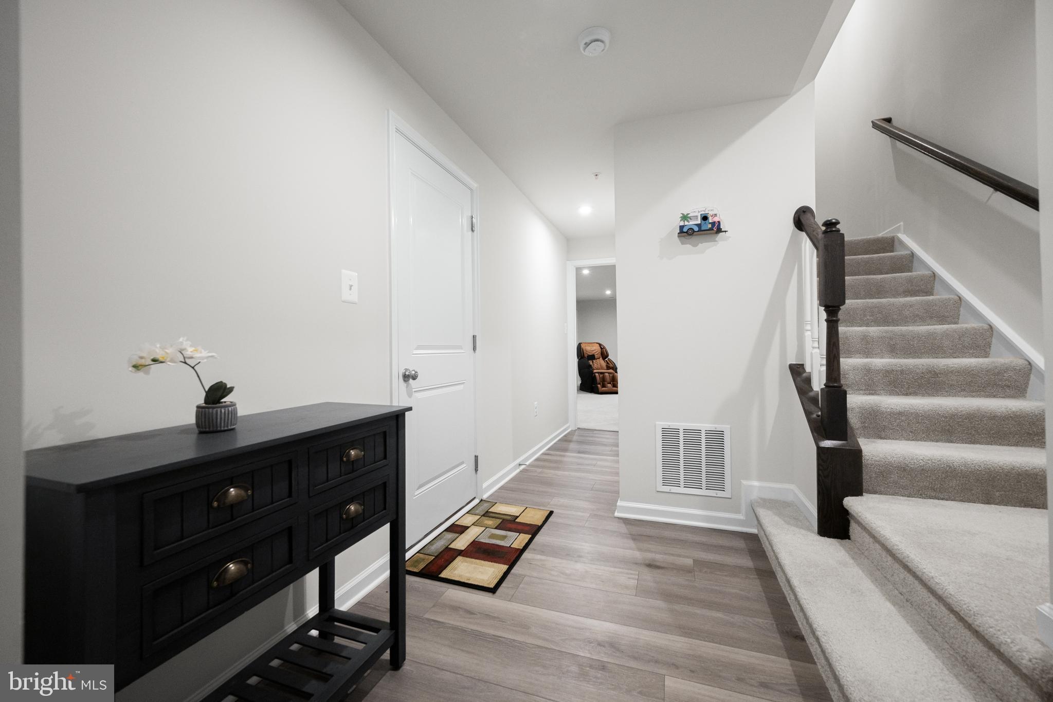3724 Valley Ford Way Hanover, MD 21076 - Photo 5 of 28 a view of entryway and hall with wooden floor