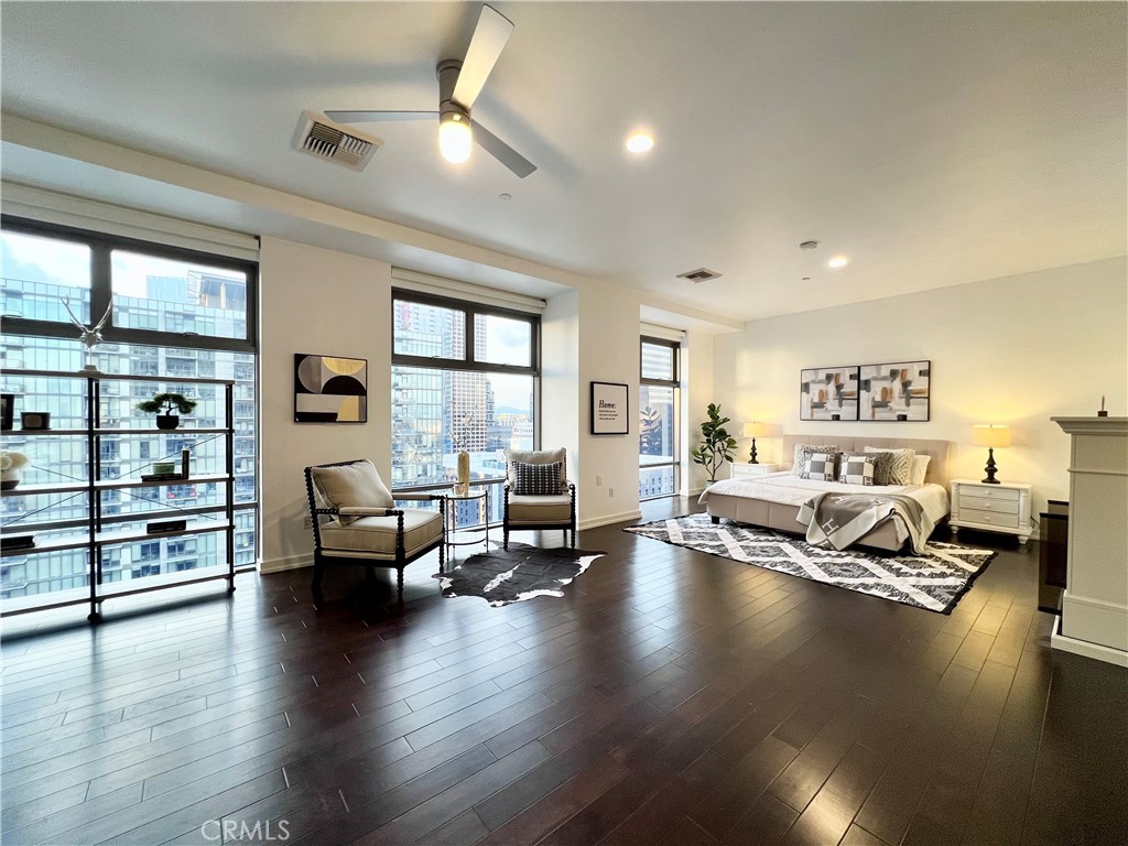 801 South Grand Avenue, Unit 1402 Los Angeles, CA 90017 - Photo 1 of 70 a living room with furniture window and a table