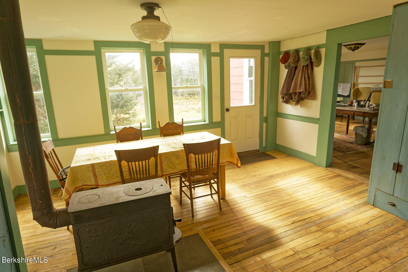 67-78 Brier Road Savoy, MA 01256 - Photo 4 of 36 a kitchen with stainless steel appliances wooden floor and furniture