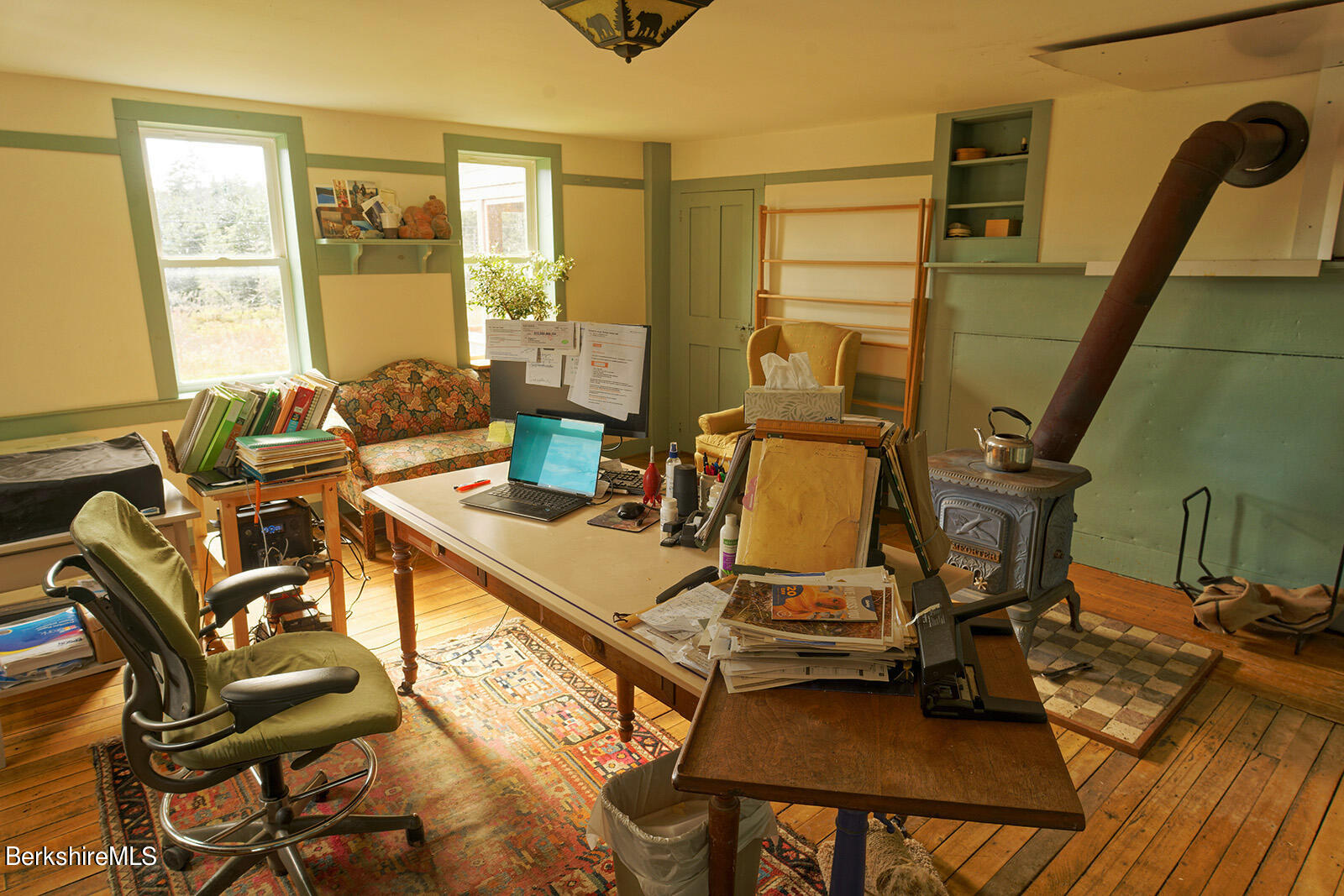 67-78 Brier Road Savoy, MA 01256 - Photo 9 of 36 a view of a workspace with furniture and a window