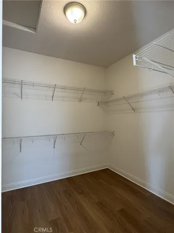 a view of a room with racks on the wall