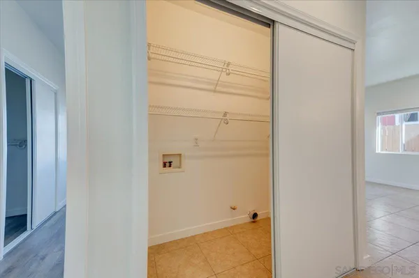 a view of livingroom with furniture and windows