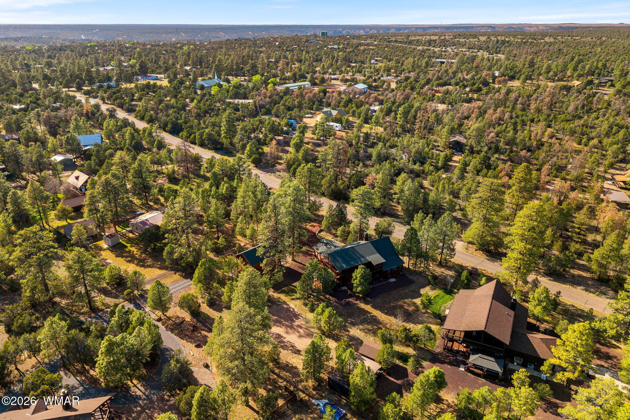 3027 Aspen Road Overgaard, AZ 85933 - Photo 61 of 74 an aerial view of residential houses with city view