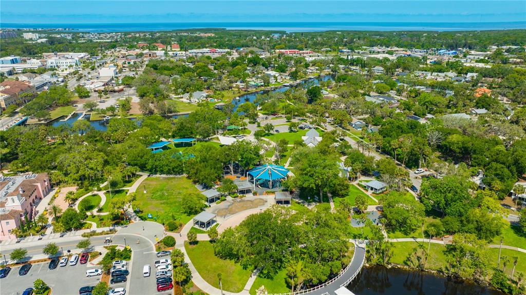 5742 Meadowlane Street New Port Richey, FL 34652 - Photo 59 of 88 a view of a garden with an outdoor space