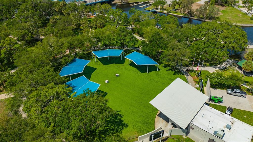 5742 Meadowlane Street New Port Richey, FL 34652 - Photo 64 of 88 an aerial view of a house with swimming pool and garden
