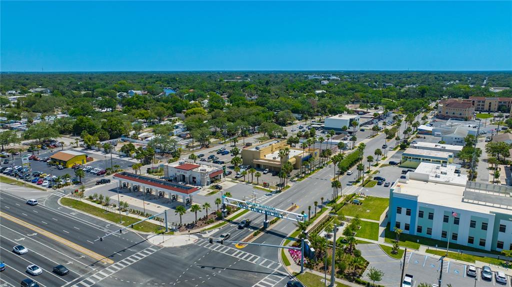 5742 Meadowlane Street New Port Richey, FL 34652 - Photo 65 of 88 an aerial view of a city with lots of residential buildings