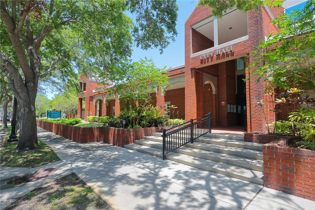 5742 Meadowlane Street New Port Richey, FL 34652 - Photo 85 of 88 a front view of a house with a yard