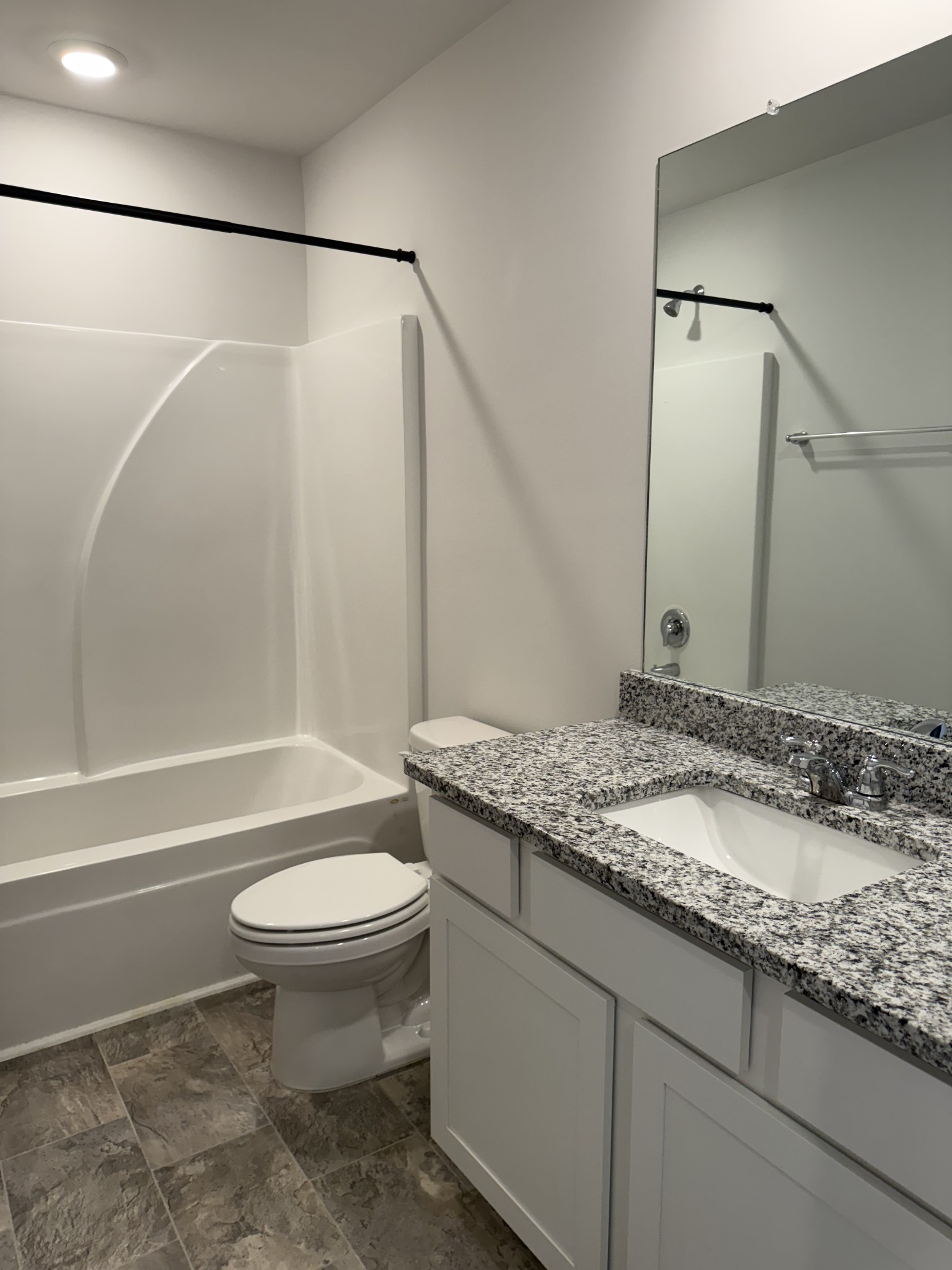 102 Cecil Road Lebanon, TN 37087 - Photo 14 of 22 a bathroom with a granite countertop sink toilet and shower