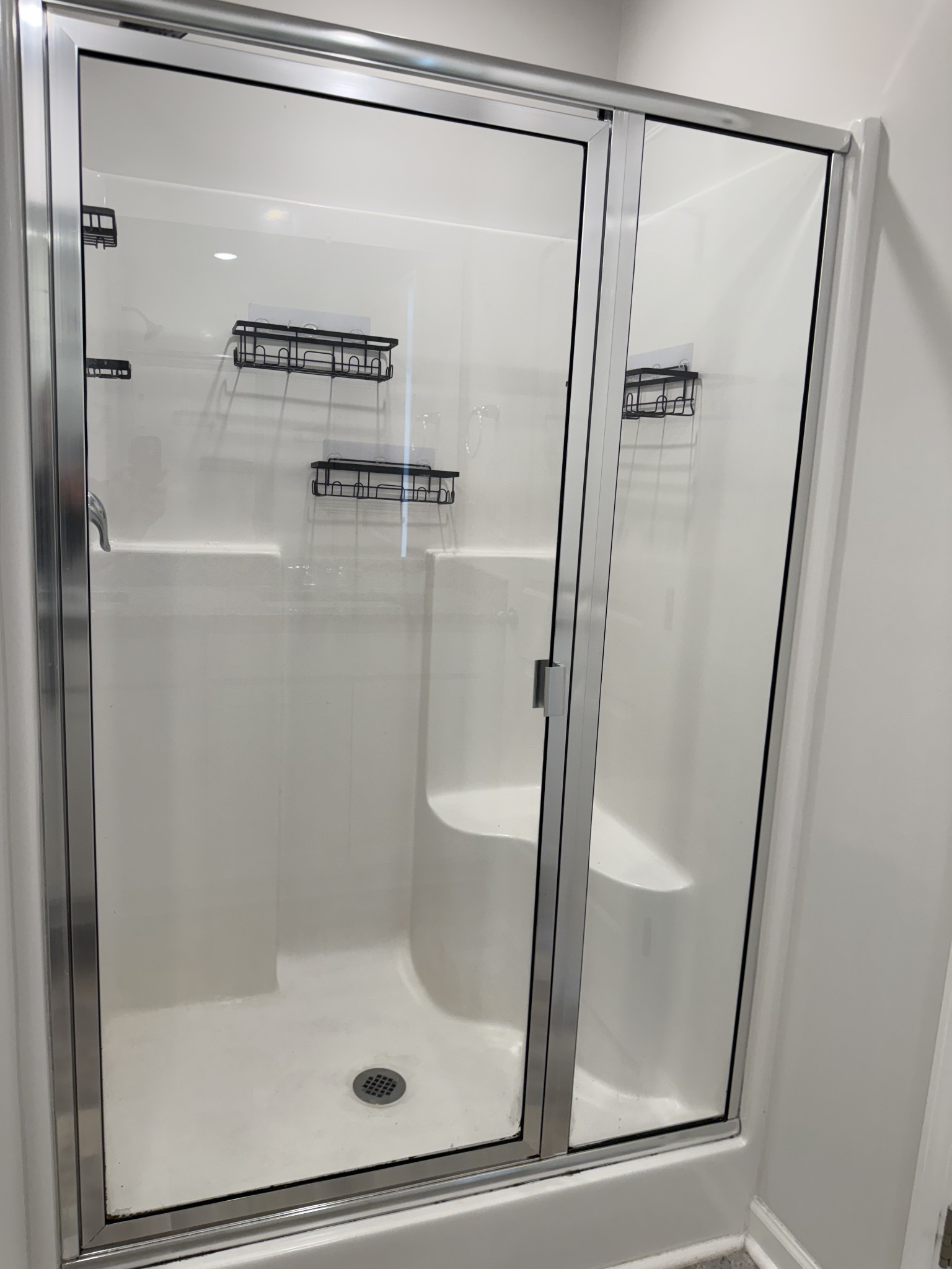 102 Cecil Road Lebanon, TN 37087 - Photo 19 of 22 a bathroom with a glass shower door