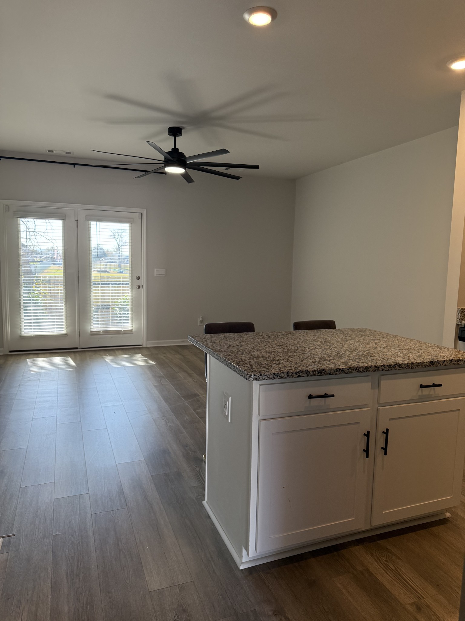 102 Cecil Road Lebanon, TN 37087 - Photo 5 of 22 a view of a kitchen with a sink dishwasher and wooden floor