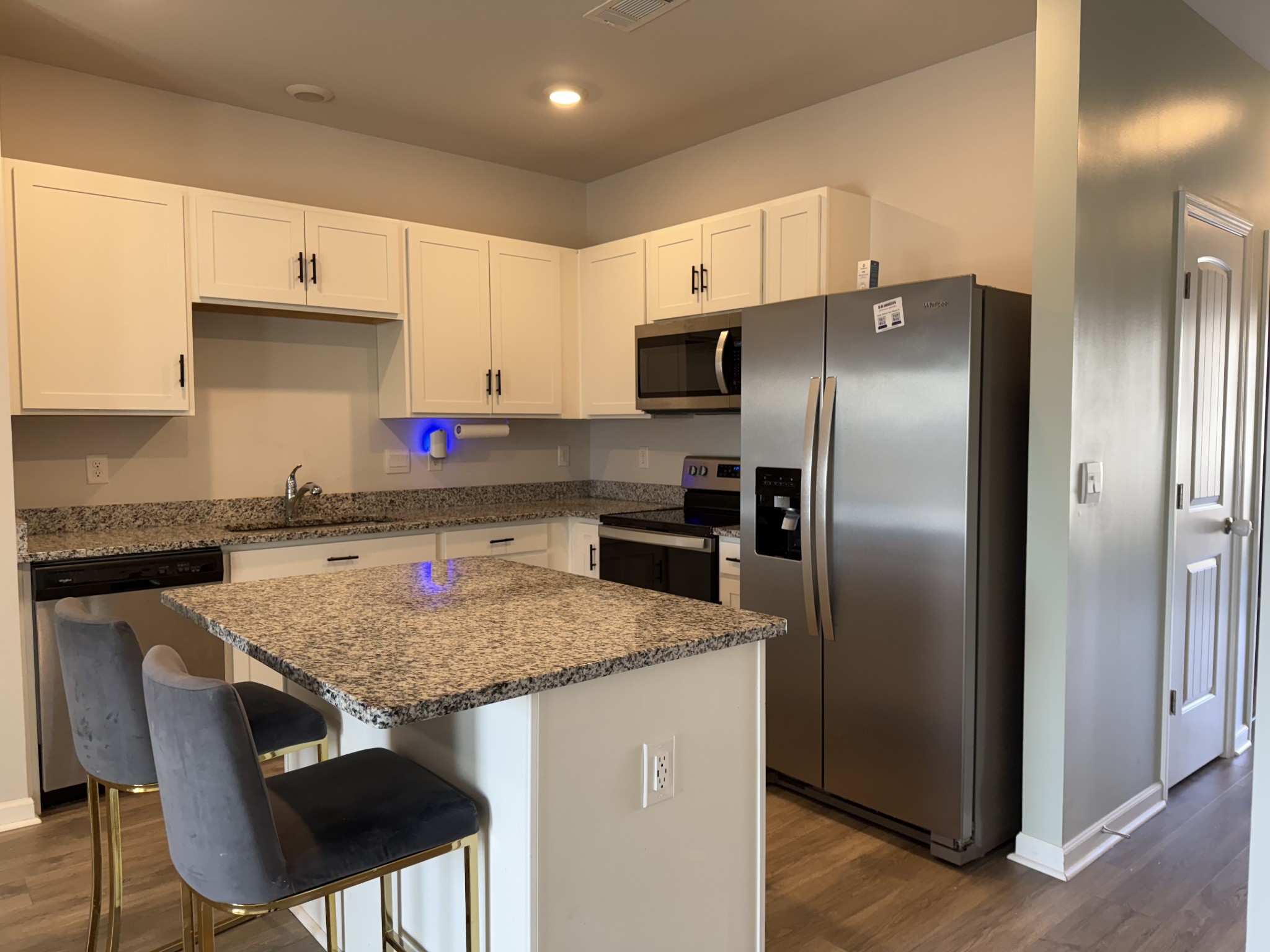 102 Cecil Road Lebanon, TN 37087 - Photo 6 of 22 a kitchen with stainless steel appliances granite countertop a stove refrigerator sink and cabinets