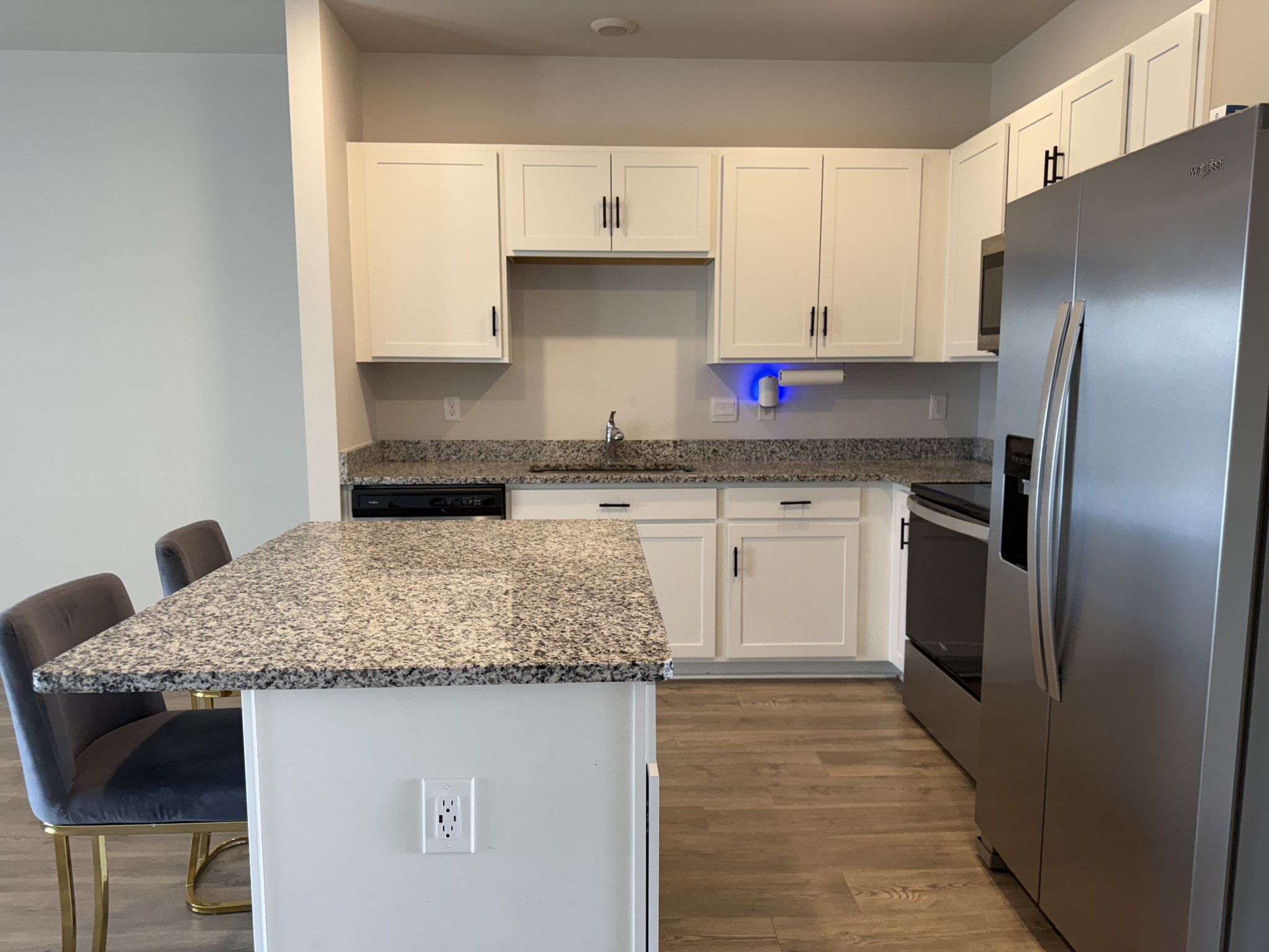 102 Cecil Road Lebanon, TN 37087 - Photo 7 of 22 a kitchen with stainless steel appliances granite countertop a sink stove and refrigerator