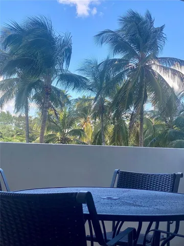 a view of balcony and wooden floor