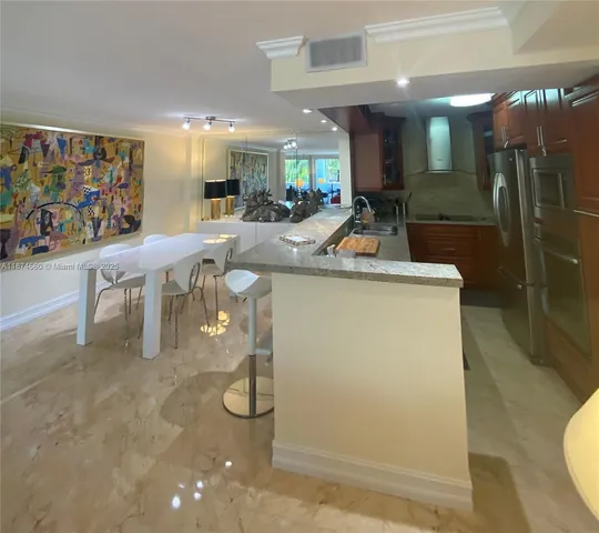 a room with lots of table chair