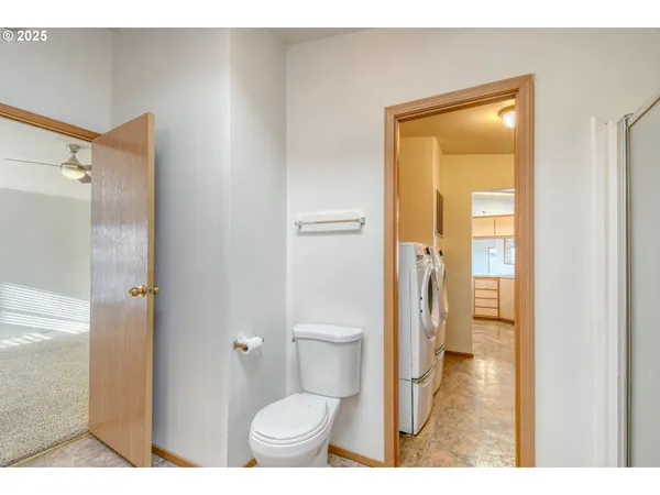 a bathroom with a granite countertop sink mirror and vanity