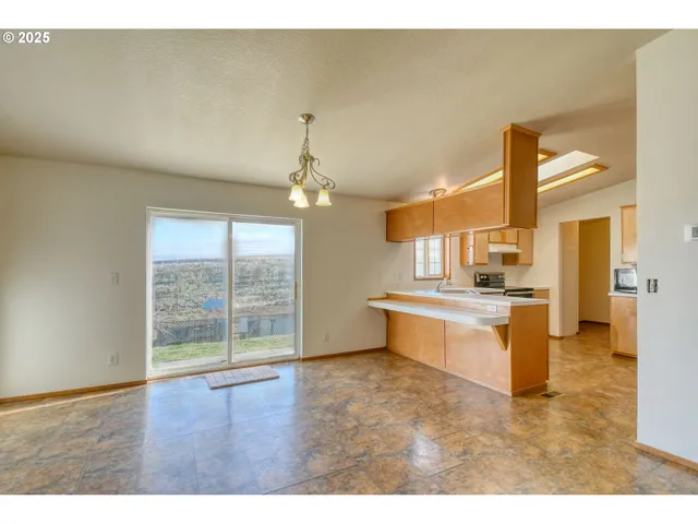 a large kitchen with a counter space