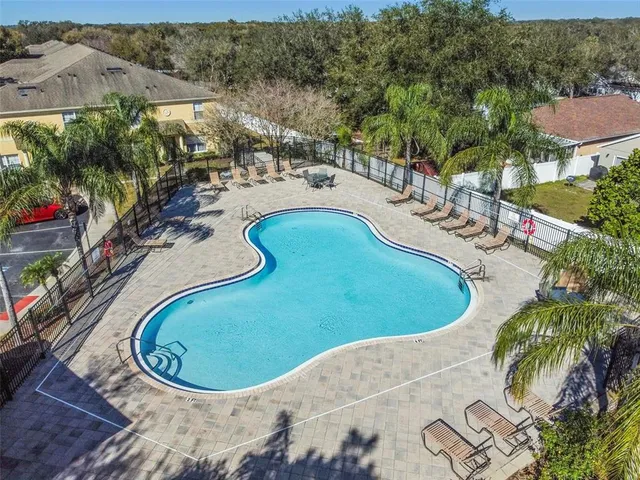 an aerial view of a swimming pool