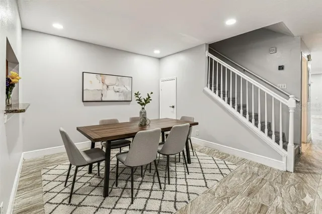 a view of a dining room with furniture
