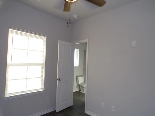 an empty room with windows