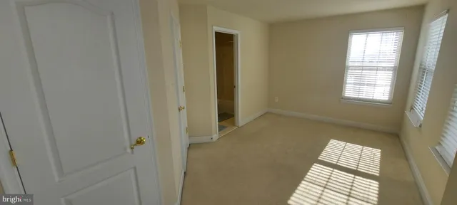 a view of hallway with windows