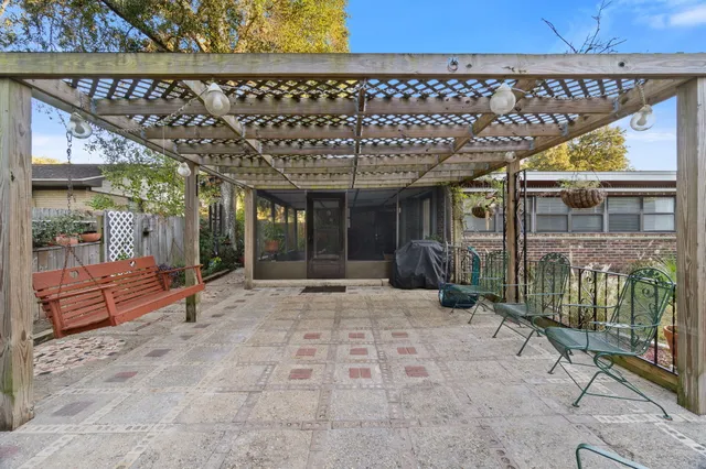 a view of a porch with furniture and a porch