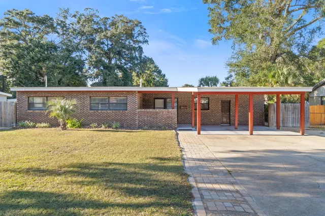 front view of a house with a big yard