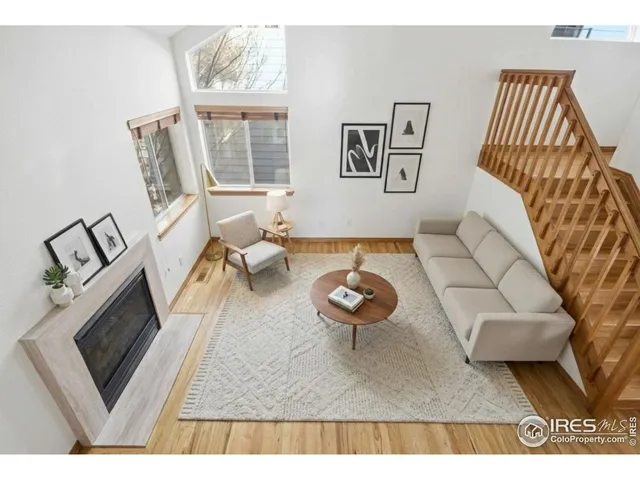 a living room with furniture and a couch