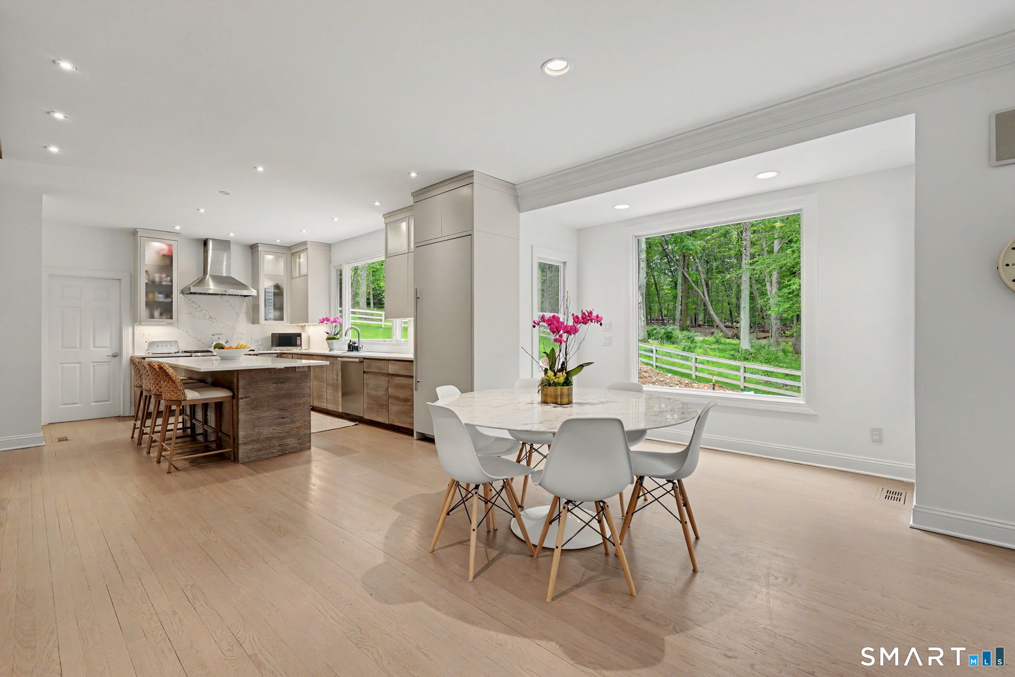 10 Side Hill Road Westport, CT 06880 - Photo 6 of 40 a outdoor dining space with furniture and window