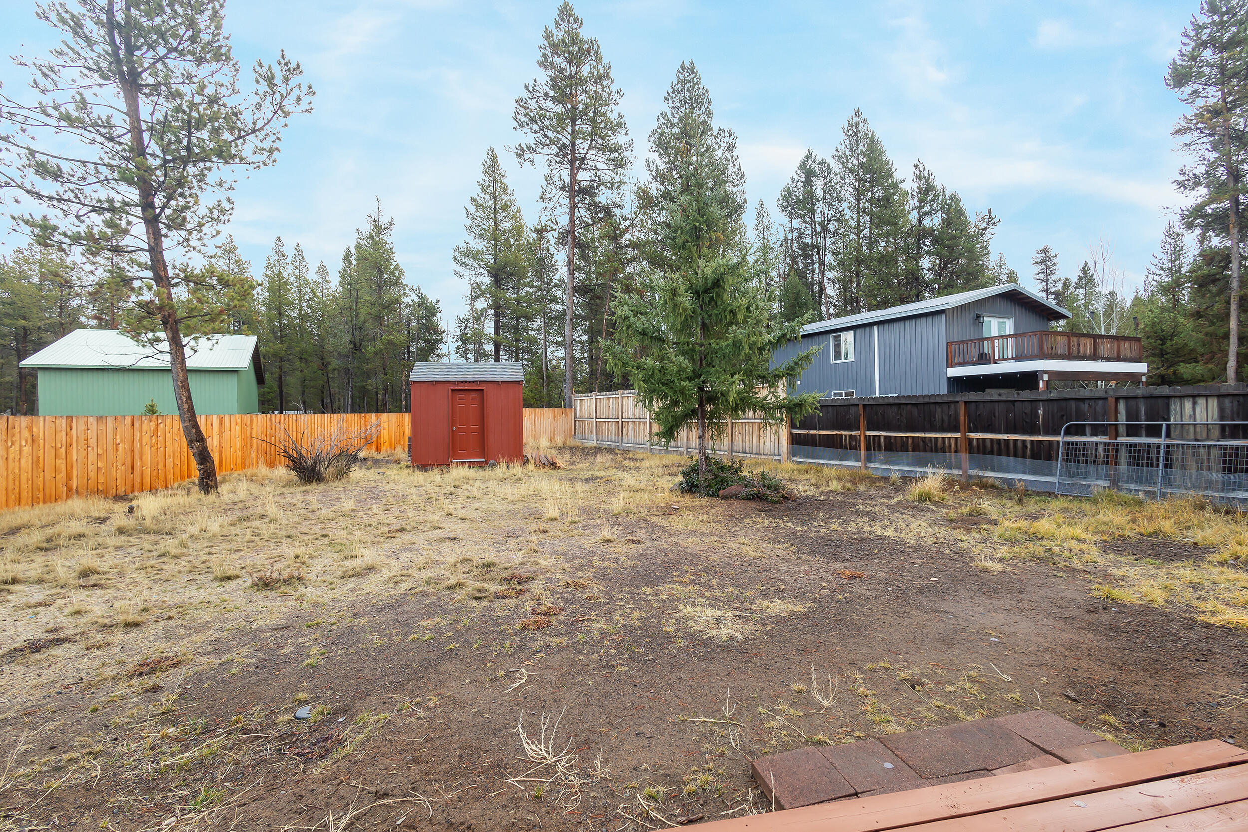 55800 Snow Goose Road Bend, OR 97707 - Photo 15 of 16 Backyard w/shed
