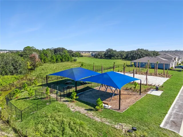 a view of an outdoor sitting area with golf course