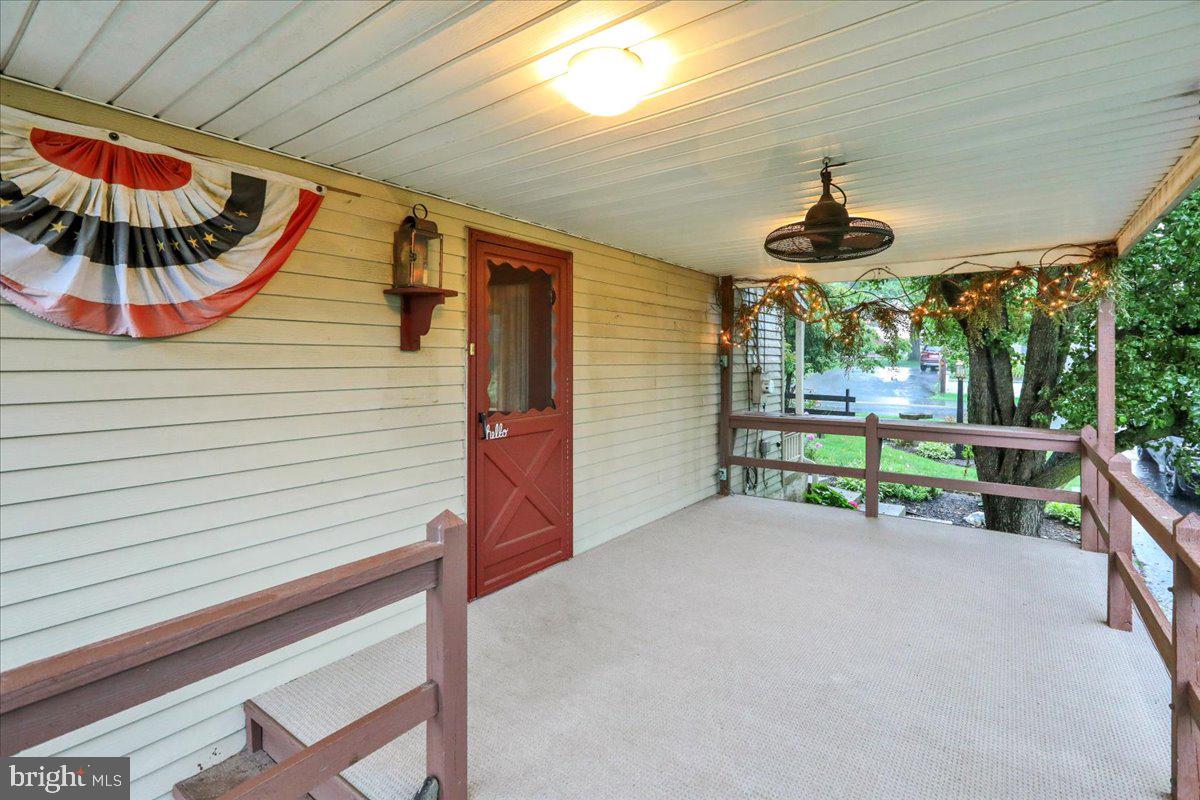 828 Pine Hill Road Lititz, PA 17543 - Photo 31 of 37 a view of an chairs and table in the balcony