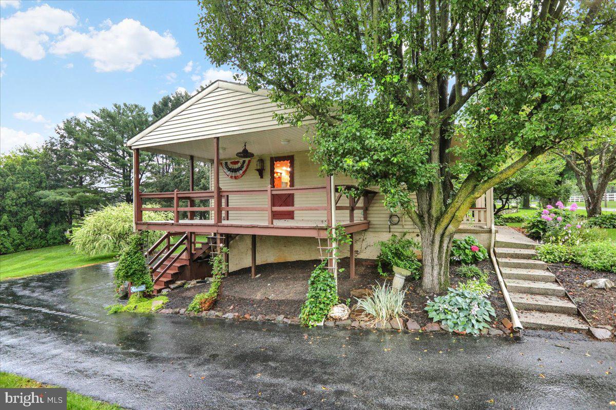 828 Pine Hill Road Lititz, PA 17543 - Photo 32 of 37 a front view of a house with garden