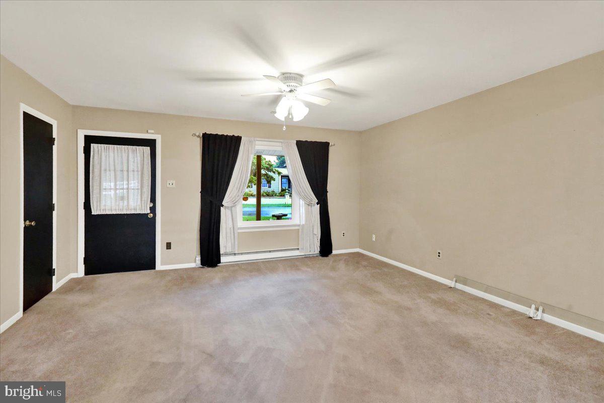 828 Pine Hill Road Lititz, PA 17543 - Photo 6 of 37 a view of an empty room with a window