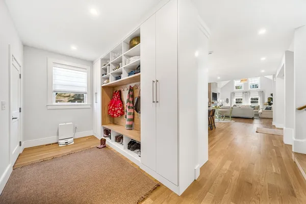 a view of a living room with furniture and a flat screen tv