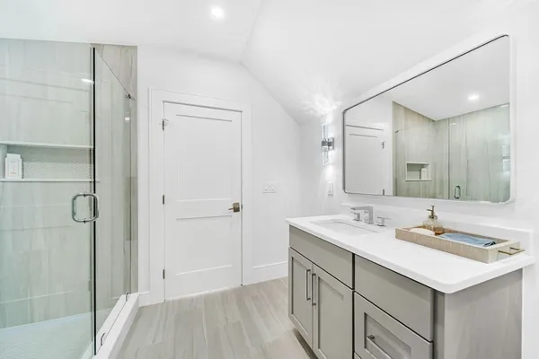 a bathroom with a sink and a mirror