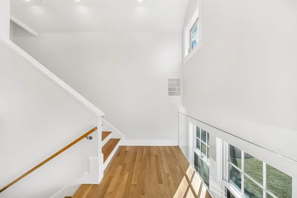 a view of a hallway with staircase
