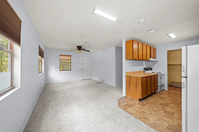 a view of a kitchen with a sink and dishwasher