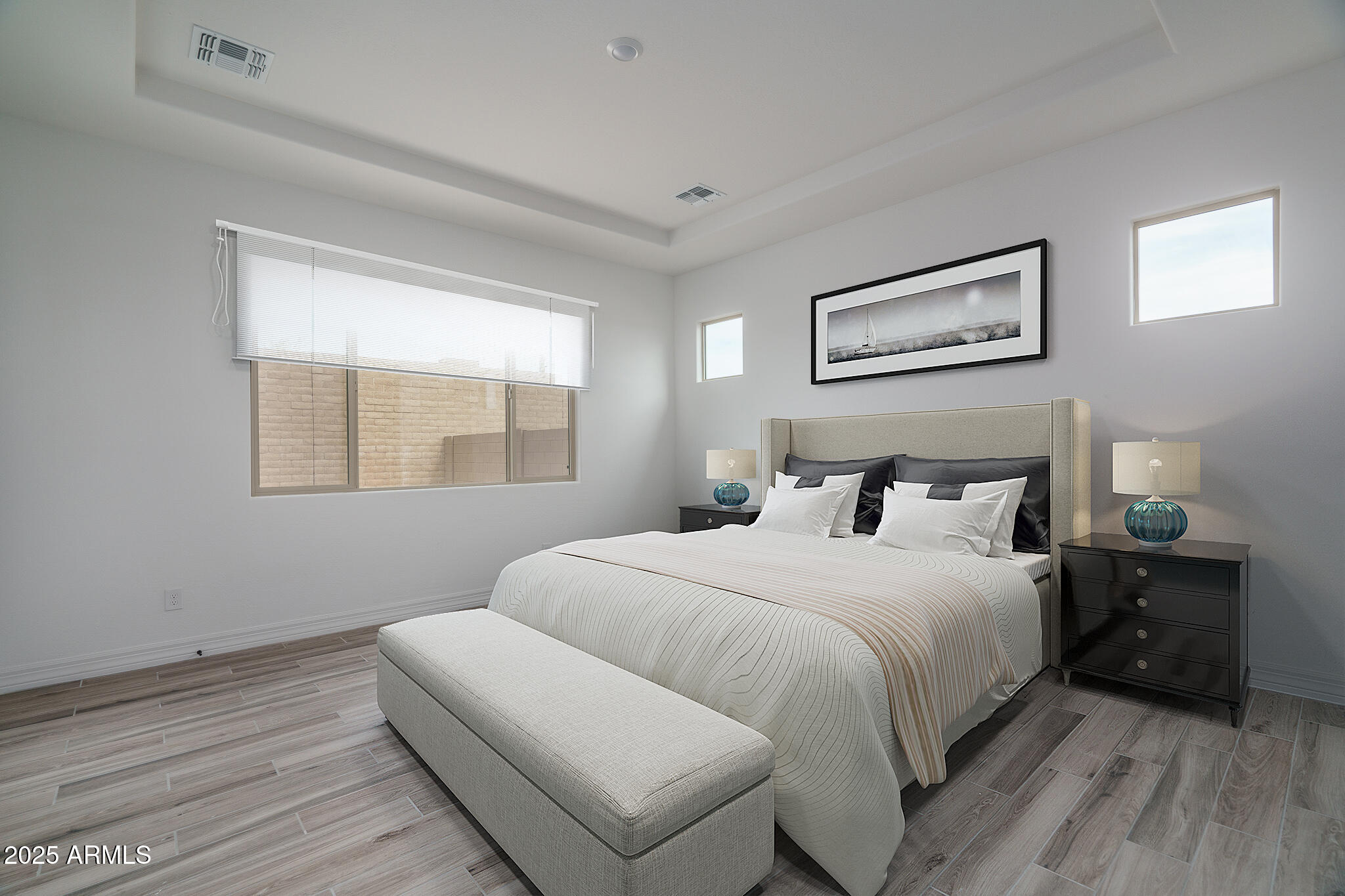 18575 West Sapium Way Goodyear, AZ 85338 - Photo 17 of 51 a bedroom with a bed and a window