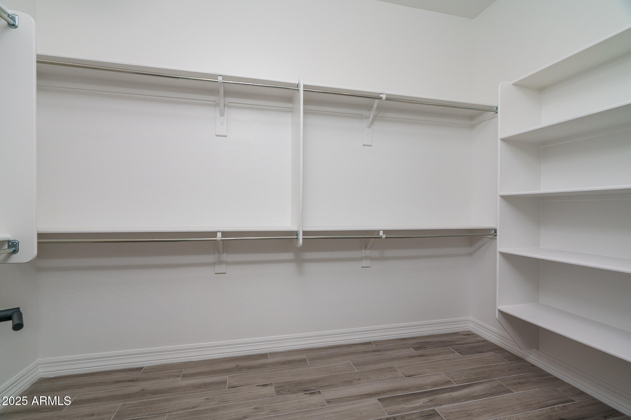 18575 West Sapium Way Goodyear, AZ 85338 - Photo 20 of 51 a view of an empty walk in closet
