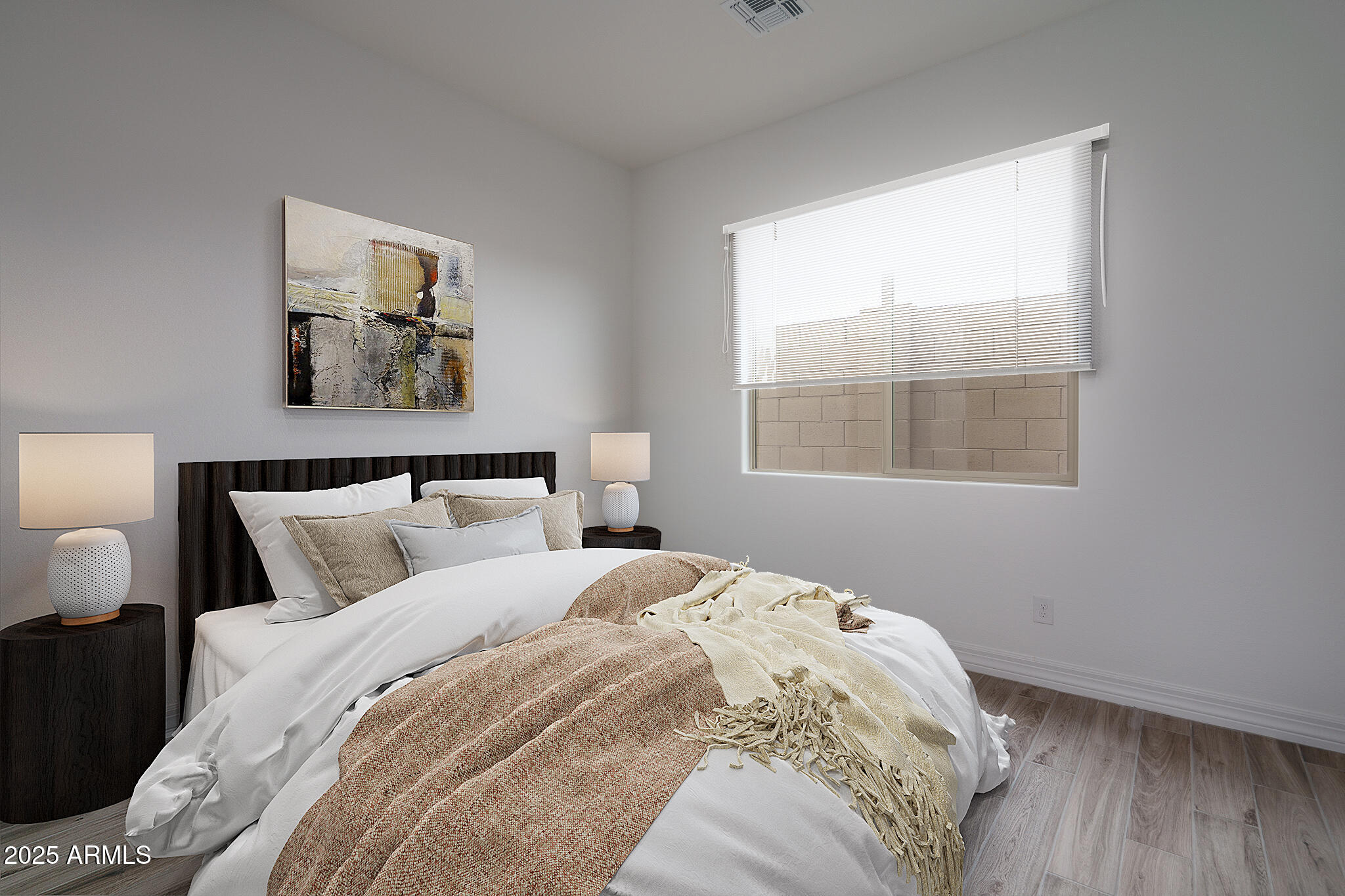 18575 West Sapium Way Goodyear, AZ 85338 - Photo 24 of 51 a bedroom with a bed and a window