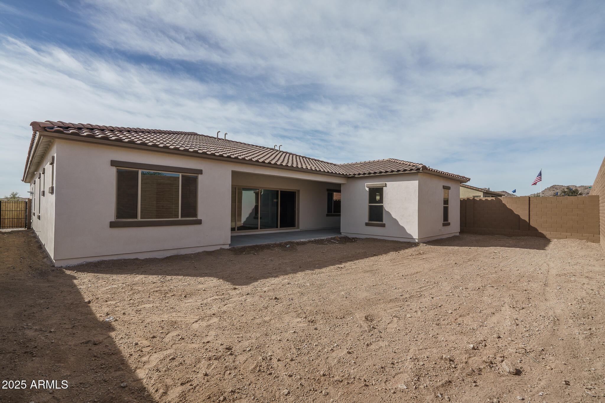 18575 West Sapium Way Goodyear, AZ 85338 - Photo 35 of 51 a house view with a backyard space