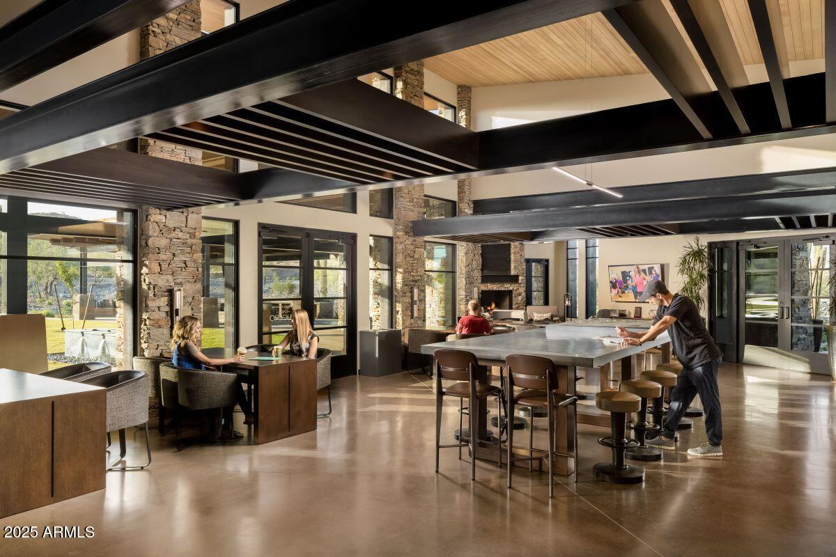 18575 West Sapium Way Goodyear, AZ 85338 - Photo 39 of 51 a view of a dining room with furniture window and outside view