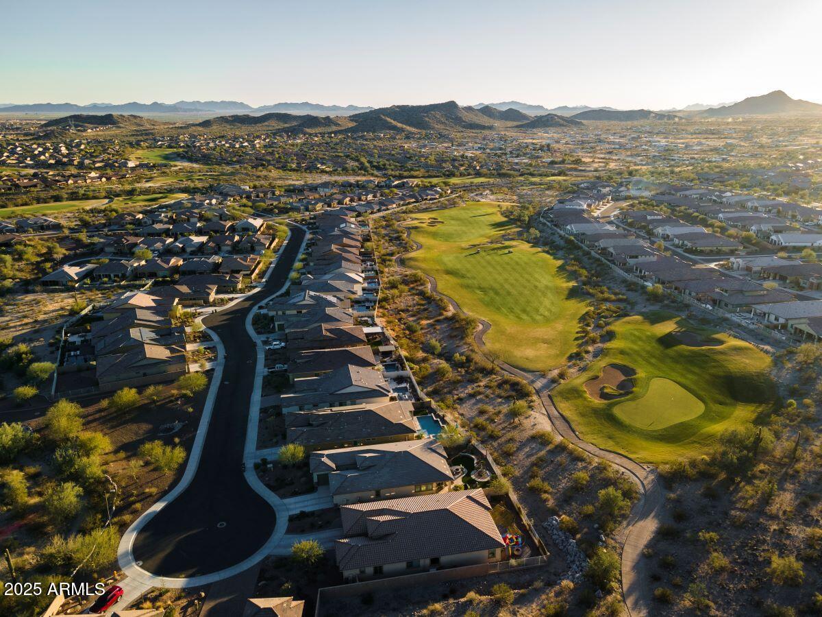 18575 West Sapium Way Goodyear, AZ 85338 - Photo 42 of 51 an aerial view of residential houses with outdoor space