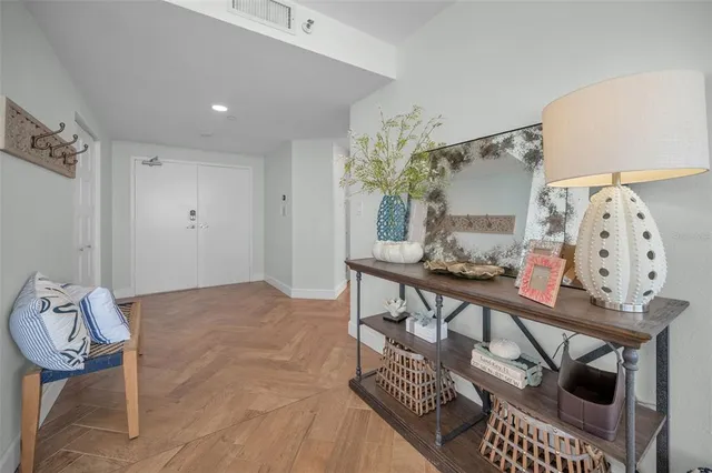 a view of a swimming pool with a lounge chairs
