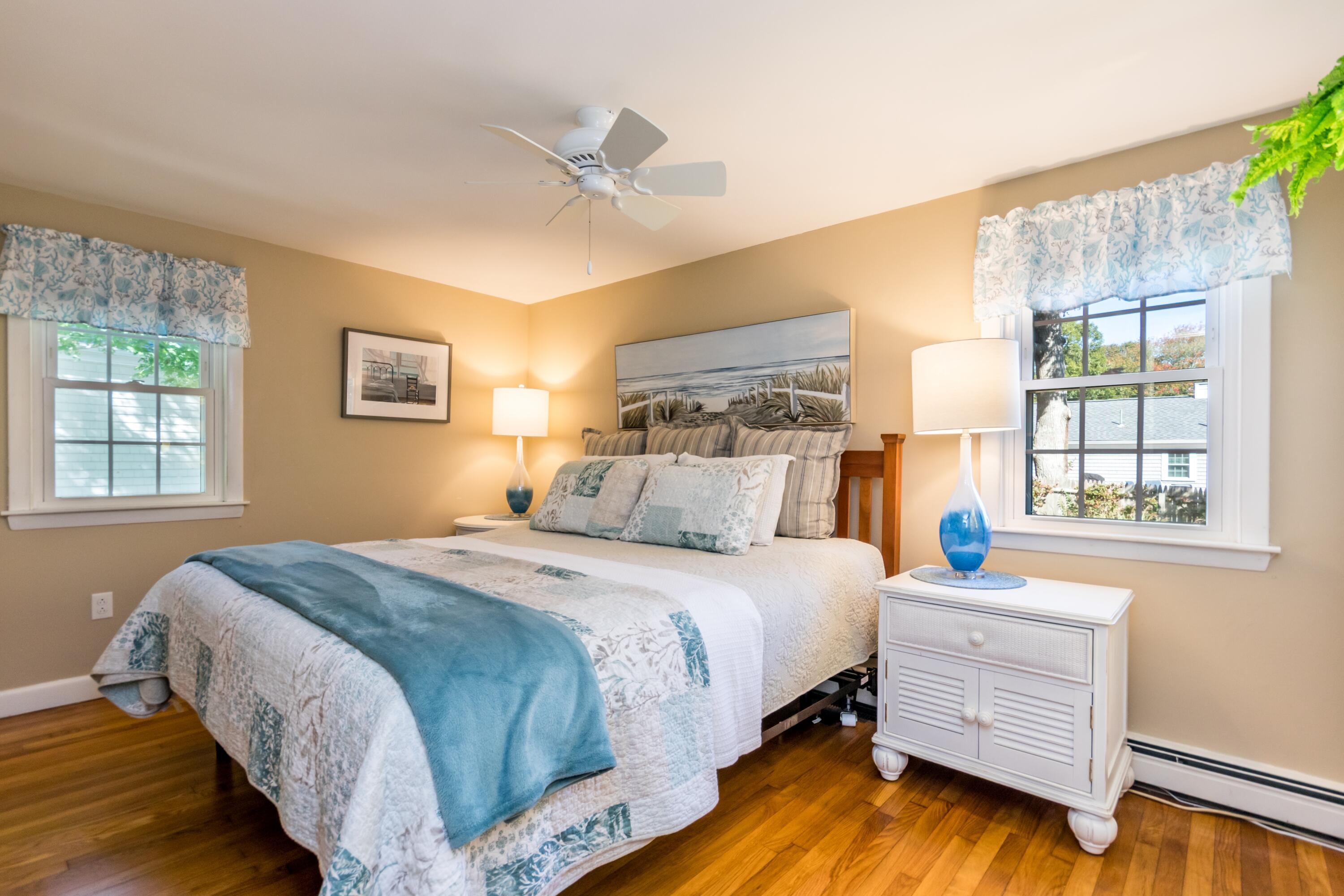 42 Agnes Road South Dennis, MA 02660 - Photo 17 of 36 a bedroom with a bed and a window