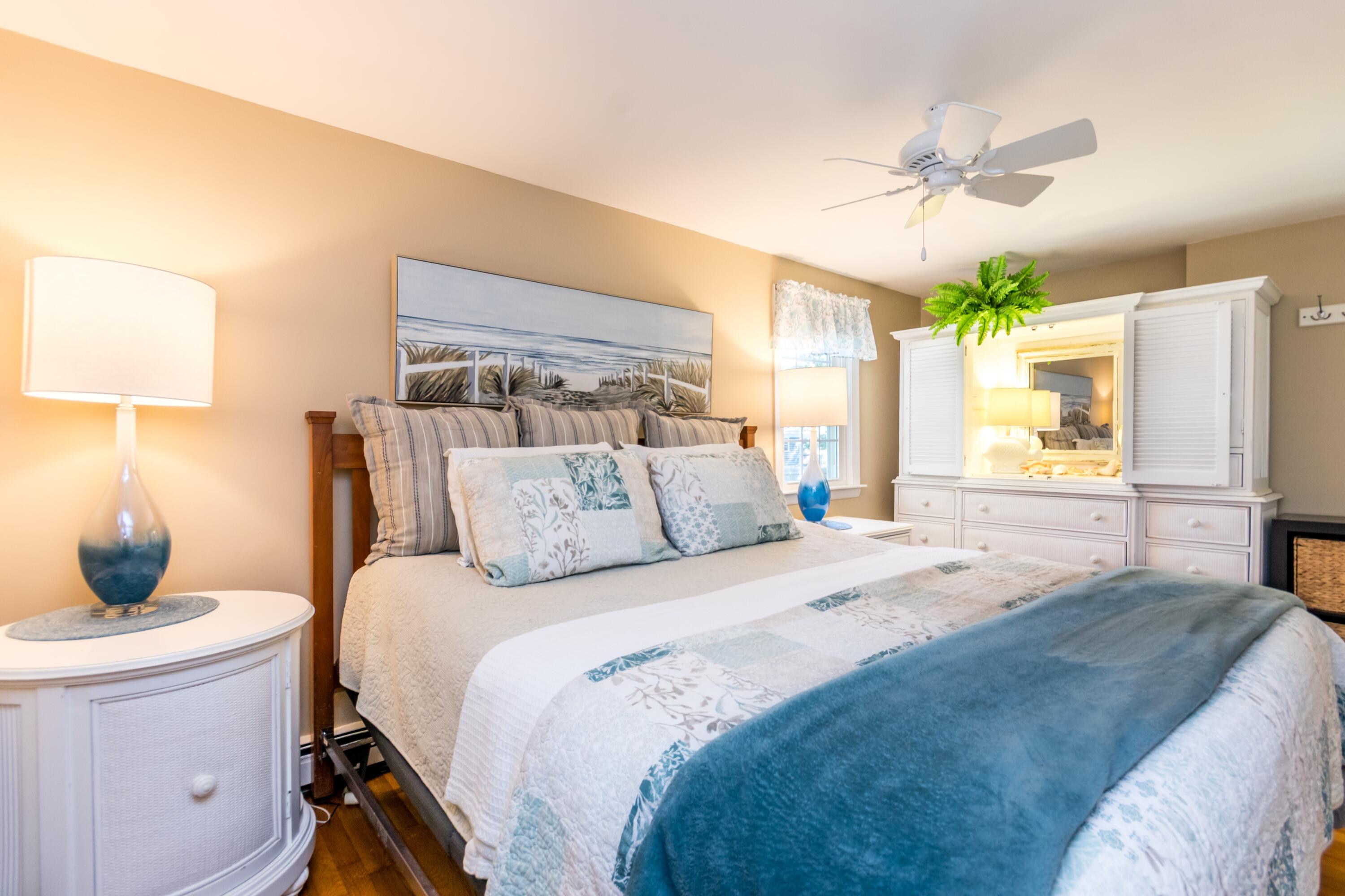 42 Agnes Road South Dennis, MA 02660 - Photo 18 of 36 a bedroom with a bed and a window