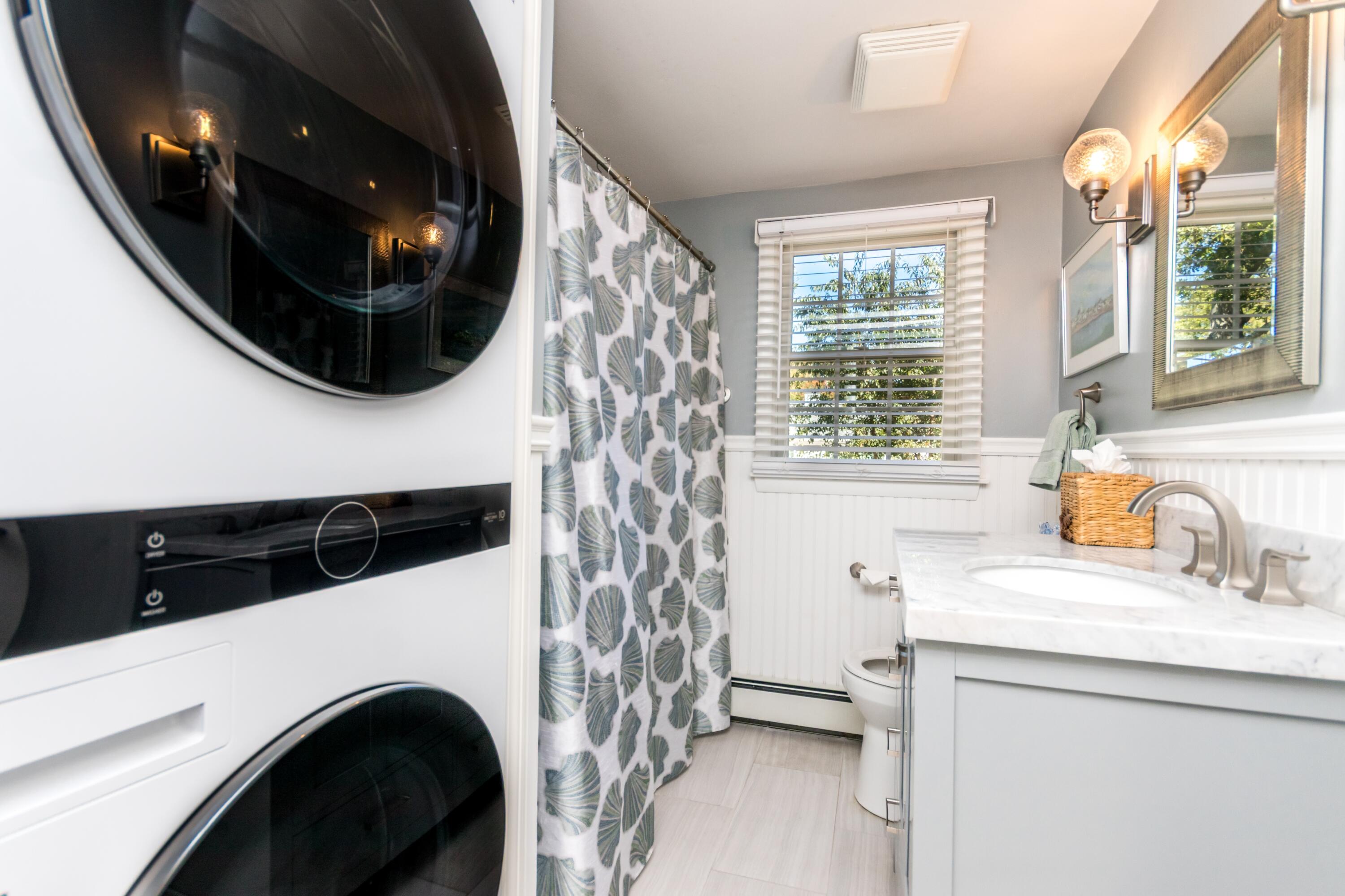 42 Agnes Road South Dennis, MA 02660 - Photo 22 of 36 a bathroom with a sink a toilet and a window