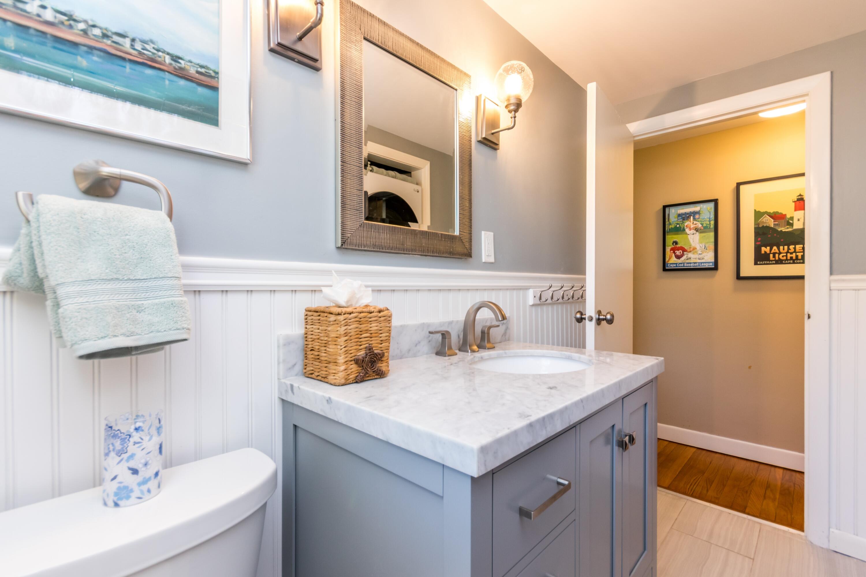42 Agnes Road South Dennis, MA 02660 - Photo 24 of 36 a bathroom with a sink and a mirror