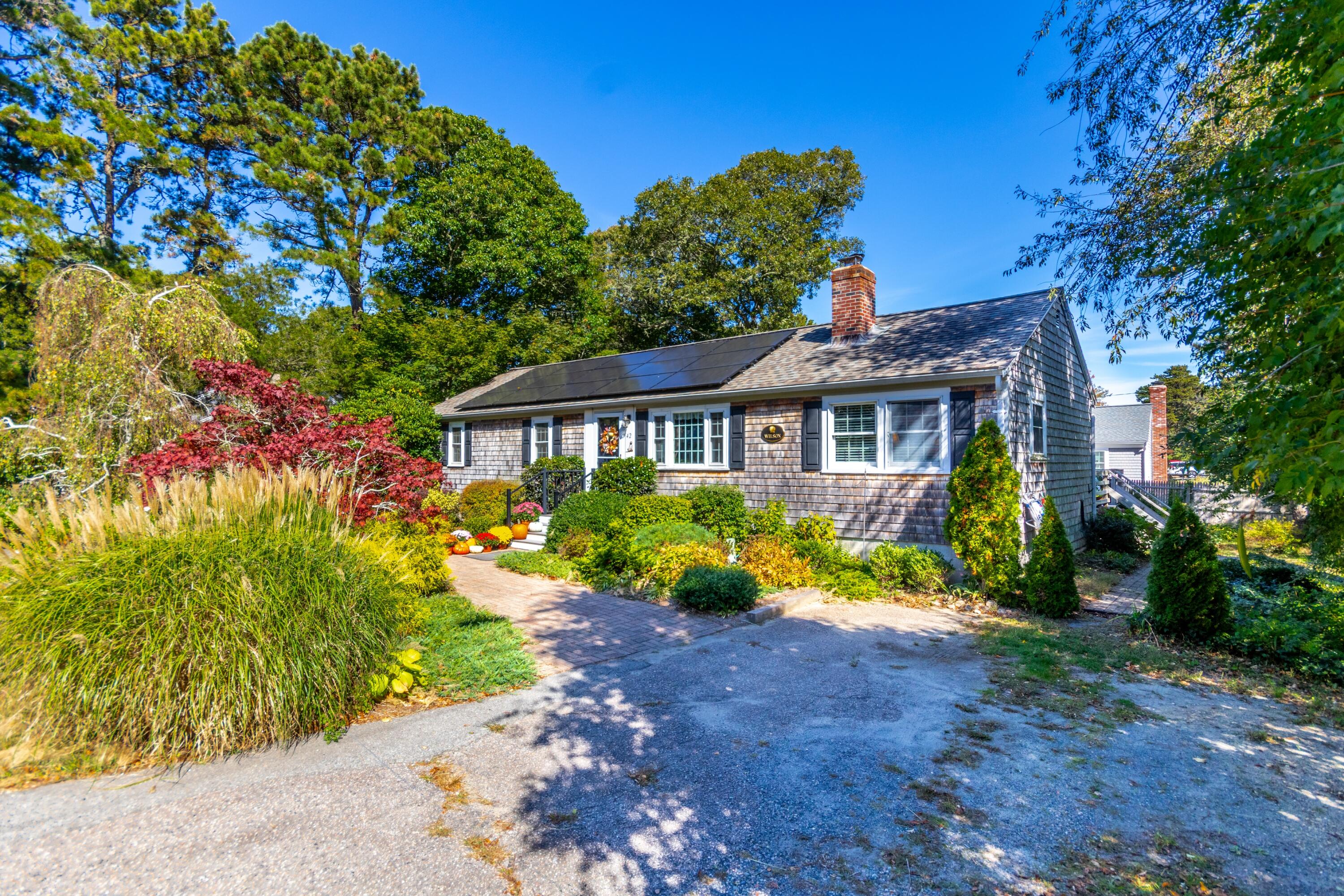 42 Agnes Road South Dennis, MA 02660 - Photo 25 of 36 a front view of house with yard and green space