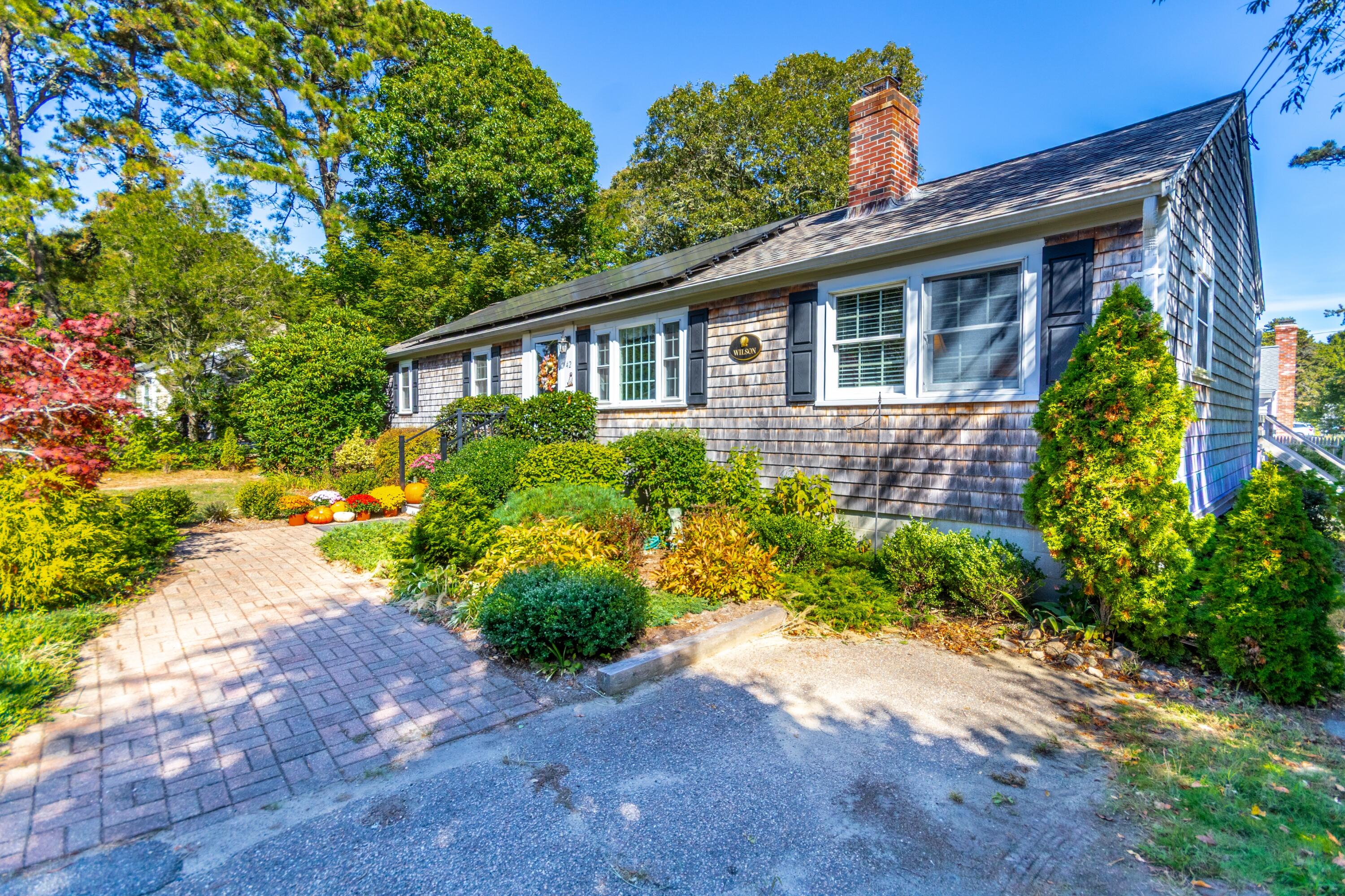 42 Agnes Road South Dennis, MA 02660 - Photo 28 of 36 a view of a back yard of the house